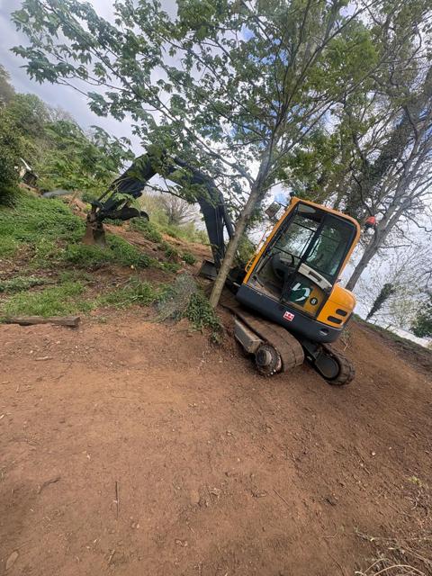 Midi excavator on a site clearance